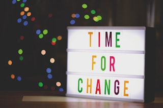 Light box with 'time for change' written on it