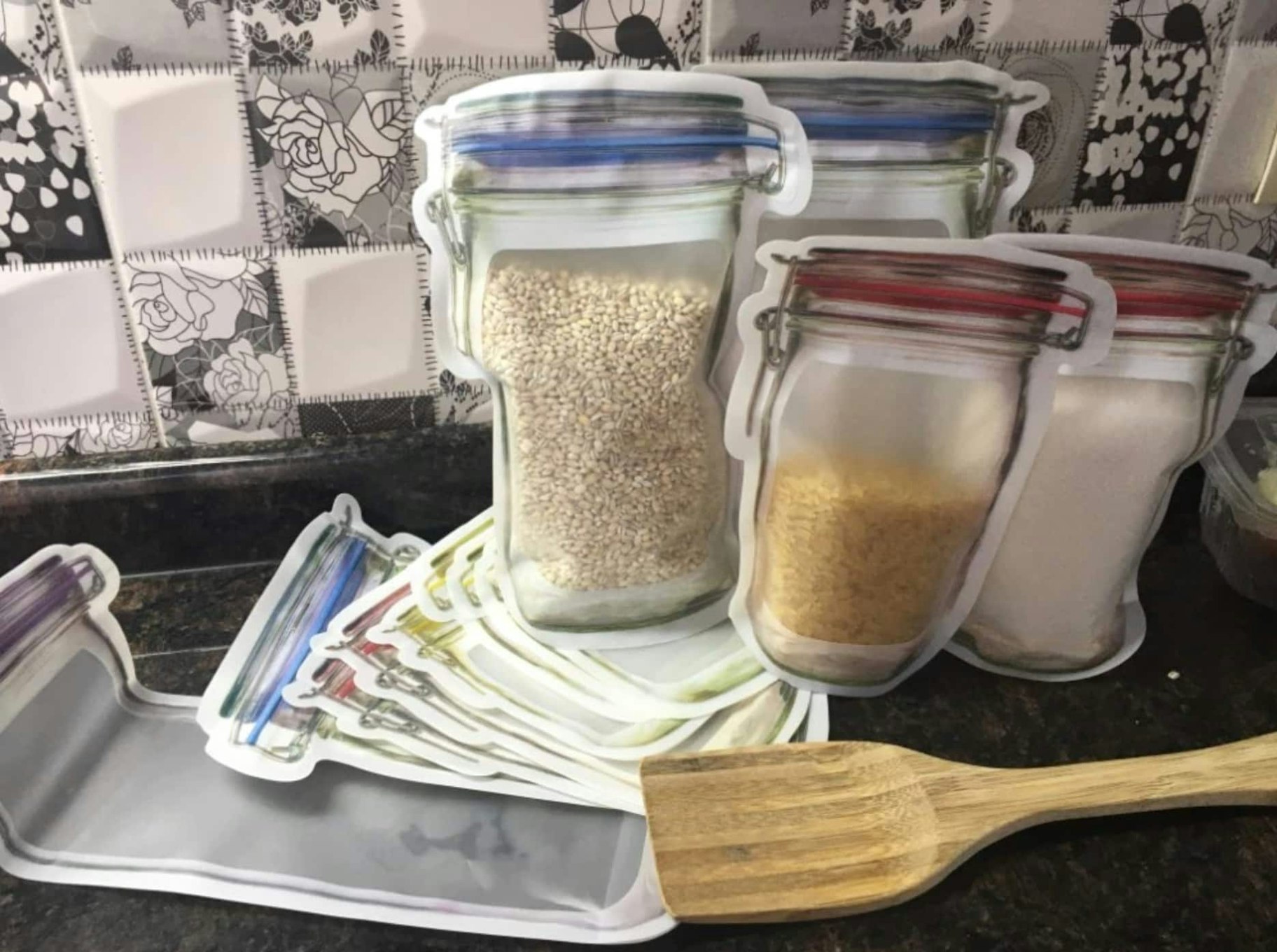 Reusable storage bags filled with pasta and oats